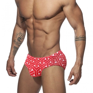 Men's low-rise swim briefs with red and white geometric pattern and elastic fit