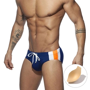 Navy blue men's swim briefs with orange side panels and internal support padding