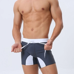 Men's athletic grey swim trunks with white side panels and adjustable drawstring waist