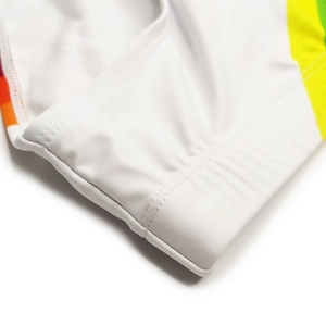 Detailed close-up of white swim briefs with colorful rainbow striped trim and flat stitching