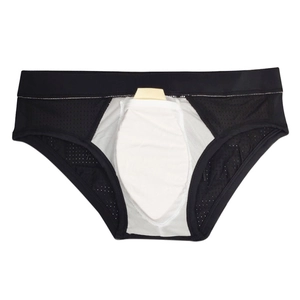 Detail view of men's breathable black mesh swim briefs featuring a white functional cup pocket