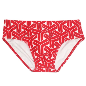 Detailed flat lay of men's triangle swim briefs with red and white 3D geometric print