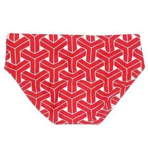 Macro view of men's swim briefs featuring red and white geometric Y-patterned texture