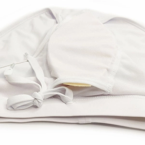 Detail shot of the internal pocket and removable padding of the men's striped swim briefs