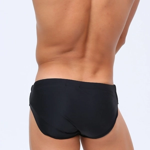 Back view of black high-elastic men's swim briefs showing athletic fit and fabric texture