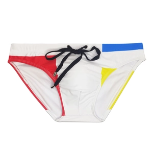 Detail of men's swim briefs with colorful geometric prints and adjustable drawstring