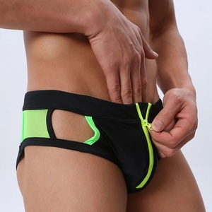Close-up of men's sexy swim briefs with front zipper and hollow-out mesh side panels