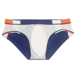Detailed view of color-block swim briefs with elastic waistband and protective padding