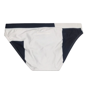 Detail of men's low-rise swim briefs with back pocket and black and white contrast design