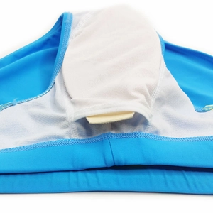 Detail of blue swim trunks featuring breathable mesh lining and removable sponge pad