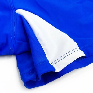 Detail of blue and white swimming trunks showing high-elastic fabric and reinforced stitching