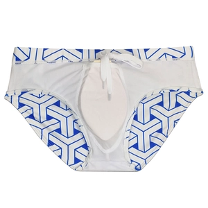 Detail of men's swim briefs with blue geometric pattern and inner pouch lining