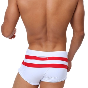 Close-up of men's white quick-dry swim trunks featuring back zipper pocket and red stripes