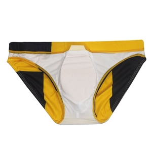 Detail view of men's color-block swimming trunks with internal protective support cup