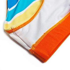Close-up of multicolor striped swimwear featuring premium stitching and knit fabric texture
