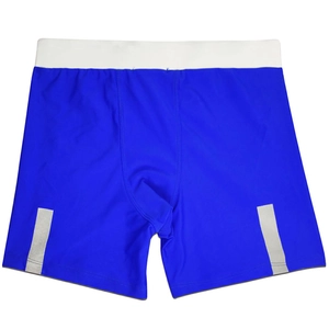 Detail view of men's swimming trunks with reflective silver strips and elastic waistband