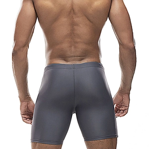 Close-up back view of men's quick-dry tight swim shorts in solid dark grey fabric