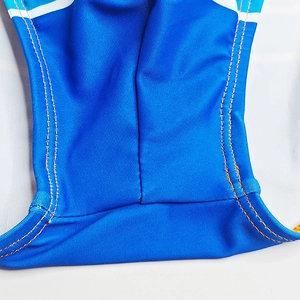 Detail of blue men swim briefs showing high-elastic fabric and orange reinforced stitching