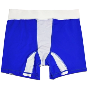 Close-up of blue and white color-block men's swim trunks with premium stitching details