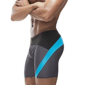 Close-up of men's quick-dry swim jammer featuring gray mesh texture and blue side stripes
