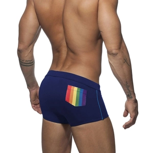 Men's dark blue square-leg swim trunks with rainbow pocket detail and blue side stripes