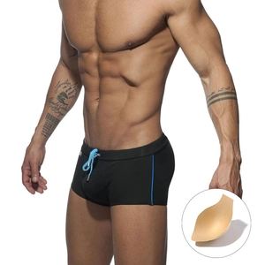 Men's black swim trunks with light blue drawstring and side stripes plus sponge cup pad