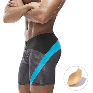 Men's dark grey honeycomb mesh swim shorts with blue side stripes and sponge padding