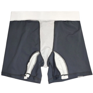 Detail of men's athletic swim shorts featuring breathable mesh panels and elastic waistband