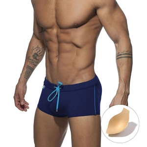 Men's navy blue square cut swim trunks with drawstring waist and removable protective padding