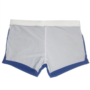 Detail of blue men's swim trunks featuring white elastic waistband and inner lining mesh