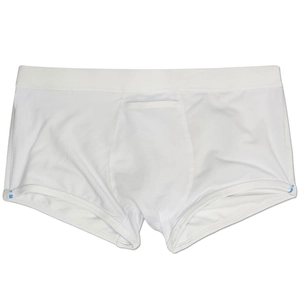 Close-up of white men's swim trunks featuring premium elastic waistband and contour pouch
