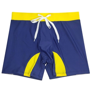 Detail view of quick-dry men's navy blue swimming trunks with bright yellow panels