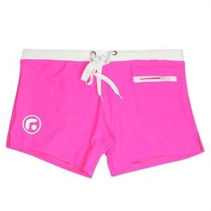 Detail view of pink quick-dry swim trunks with white drawstring and zipped side pocket