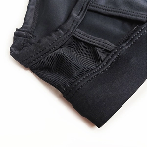 Detail view of men's swim briefs featuring breathable mesh panels and sturdy stitching