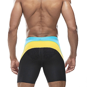 Detailed back view of men's tricolor swim trunks with breathable black mesh fabric