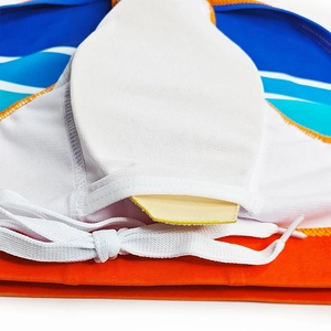 Close-up of men's swim briefs showing internal mesh pocket and removable foam cup insert