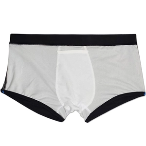 Detail of men's swimming trunks featuring contrast edging and breathable pouch lining