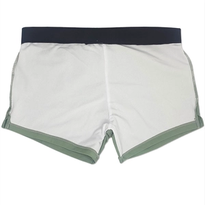 Detail of men's swimming trunks showing quick-dry fabric and breathable mesh lining