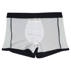 Detail view of men's swimming trunks featuring honeycomb mesh side panels and reinforced seams