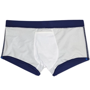 Detail of men's swimming trunks showing U-convex pouch structure and white mesh lining