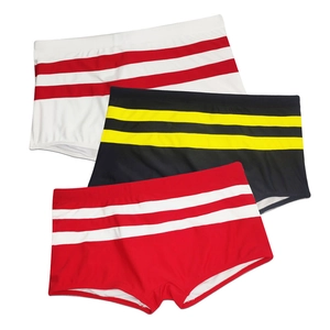 Detailed set of three men's quick-dry swim trunks with contrast stripes and pockets