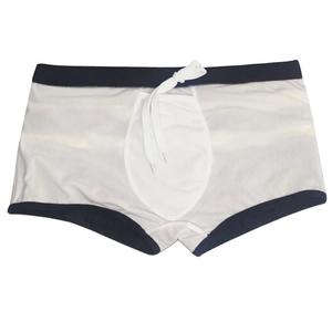 Detail view of men's quick-dry swim trunks with navy blue contrast trim and white drawstring