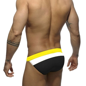 Rear view of men's athletic swim briefs featuring a yellow, white, and black color-block design