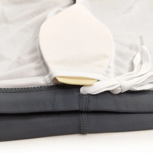 Detail view of quick-dry men's swim shorts with elastic waistband and drawstring