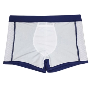 Detailed view of breathable honeycomb mesh fabric and inner pouch on men's swim trunks