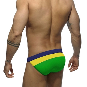 Rear view of tri-color patchwork men's swim briefs with high-cut design and elastic fabric