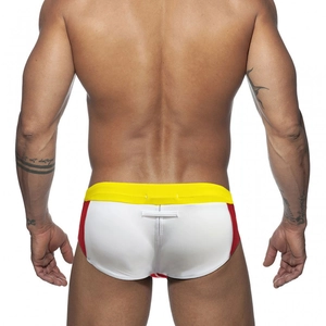 Rear view of men's tricolor swim briefs featuring white, yellow, and red patchwork panels