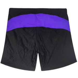 Detail of men's athletic shorts featuring purple and black mesh panels and elastic waistband