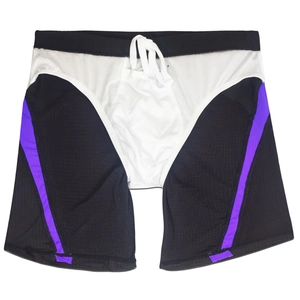 Detail of men's athletic shorts featuring tricolor mesh panels and drawstring waistband
