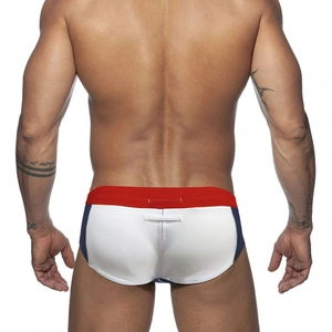 Rear view of men's athletic swim briefs with red, white, and blue color-block design